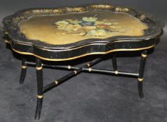 A 19th Century papier-maché tray in the manner of Jennens & Bettridge,