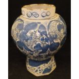 An 18th Century tin glazed pottery vase of baluster octagonal form,