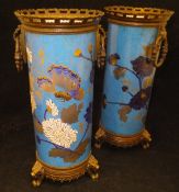 A pair of 19th Century French polychrome glazed pottery vases by Creil & Montereau decorated in