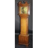 A mid 18th Century oak long case eight day clock with swan neck pediment,