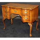 A walnut lowboy in the 18th Century Dutch taste,