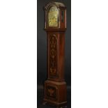A 19th Century mahogany long case clock with arched top over a marquetry inlaid door featuring