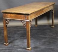 A George III mahogany serving table in the Chippendale taste,