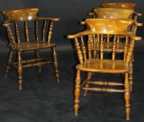 A set of four oak and elm smoker's bow chairs,