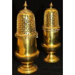 A pair of 18th Century gilt bronze casters with pierced bayonet fitting covers and knop finials on