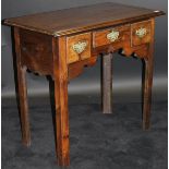 A Georgian mahogany lowboy,