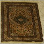 A fine silk rug,