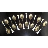 A set of late 20th Century silver gilt and enamel decorated teaspoons,