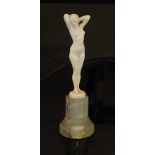 JOSEPH JULES EMMANUEL CORMIER (FRENCH 1869-1950) CALLED JOE DESCOMPS - a carved ivory figure of a