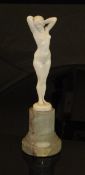 JOSEPH JULES EMMANUEL CORMIER (FRENCH 1869-1950) CALLED JOE DESCOMPS - a carved ivory figure of a