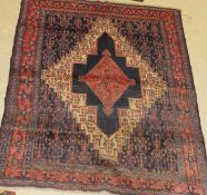 A Persian style rug,