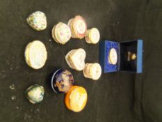 A collection of various trinket boxes including five Halcyon Days enamel examples,