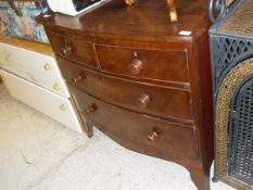 A Victorian mahogany bow fronted chest of two short over two long drawers on bracket feet
