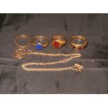 A collection of four various 9 carat gold rings and a 9 carat gold Masonic pendant and chain (17 gm