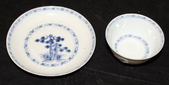 An 18th Century Chinese blue and white Nanking Cargo tea bowl and saucer with labels inscribed