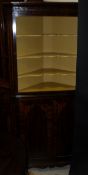 A 19th Century mahogany and inlaid corner cupboard,
