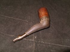 A Victorian carved wood pipe as a stockinged and booted ladies leg bent at the knee