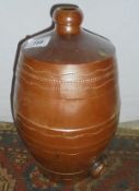 A bronze mortar and stoneware flask