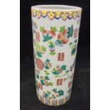 An early 20th Century Chinese polychrome decorated cylindrical vase with various floral sprays and