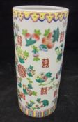 An early 20th Century Chinese polychrome decorated cylindrical vase with various floral sprays and