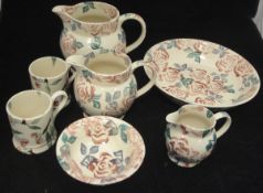 Three Bridgewater sponge wear "Roses" pattern graduated jugs, bowl, two mugs,