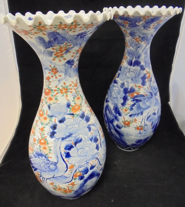 A pair of 20th Century Japanese vases with flared rims,