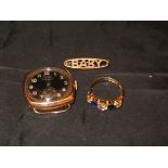 A 9 carat gold mounted dress ring set with five paste stones to simulate diamond and sapphire,