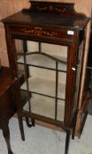 A reproduction mahogany side table with single pull-out drawer on cabriole legs,