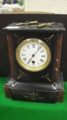 A Victorian black slate and rosso marble cased mantle clock,