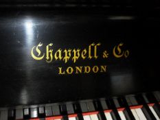 A Victorian walnut and inlaid upright piano,