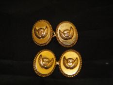 A pair of 18 carat gold gents cufflinks with Raphael style cherubic relief work decoration, 13.