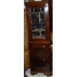 A circa 1900 mahogany corner cabinet of small proportions,