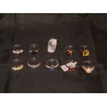 A collection of ten sterling silver and gem set dress rings including tanzanite and white topaz,