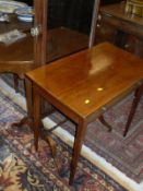 A 19th Century mahogany and boxwood strung single drawer side table on square tapered legs,