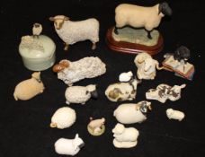 A collection of various animal figures to include Beswick ram, two Beswick lambs,