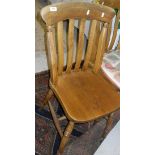 A set of six stained beech slat back kitchen chairs CONDITION REPORTS Appear to be a