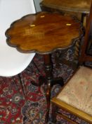 An Edwardian mahogany dish topped occasional table,