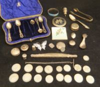 A box containing various silver and white metal wares including an enamel butterfly brooch,