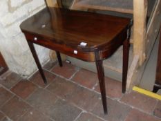 A 19th century mahogany tea table of rectangular form, the plain top with rounded corners,