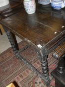 A 17th century and later oak side table, formerly with drawer and with other alterations,