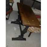 A pair of cast iron based Victorian pub tables by Payton of Birmingham with non-matching