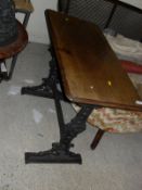 A pair of cast iron based Victorian pub tables by Payton of Birmingham with non-matching