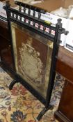 A Victorian ebonised framed fire screen,