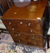 A 19th Century mahogany commode as a chest of four drawers on splayed bracket feet,