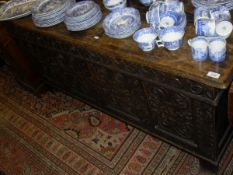An oak coffer in the 17th Century style,