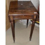 An early 19th Century mahogany drop leaf side table in the manner of GILLOWS,