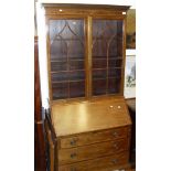 An Edwardian mahogany and rosewood cross banded bureau/bookcase,