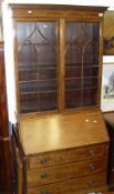 An Edwardian mahogany and rosewood cross banded bureau/bookcase,
