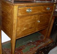 A mahogany two door display cabinet with astragal glazed doors enclosing shelves on cabriole legs,