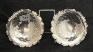 A pair of George V silver pedestal sweet meat dishes with dragon scale and pierced decoration